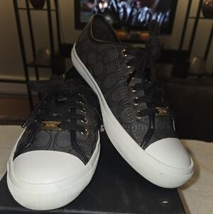 Coach Black and White Sneakers with Gold Accents